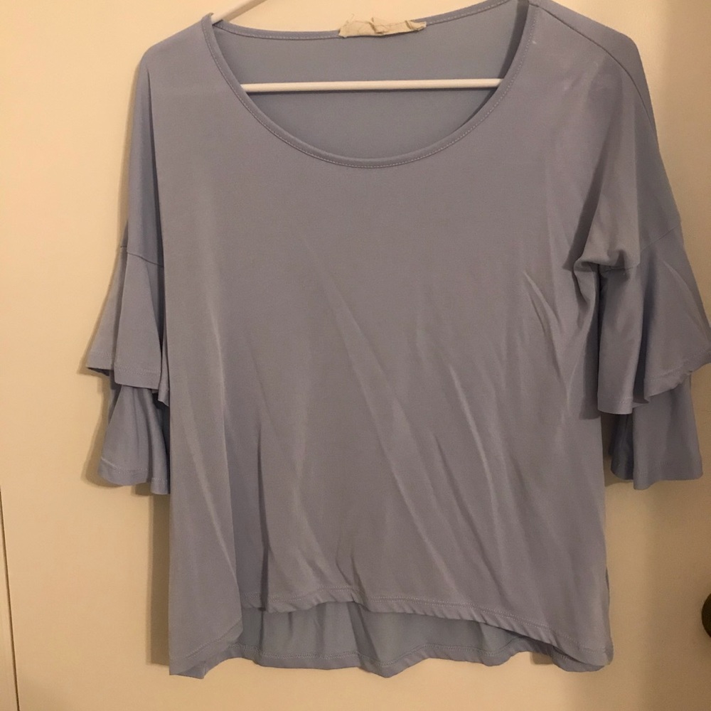 Light blue bell sleeved blouse